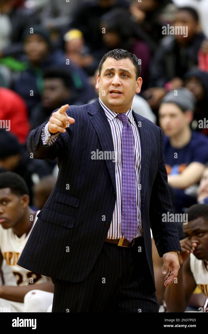 Christ the King head coach Joe Arbitello is seen against Cardozo during their high school basketball game in Middle Village, NY on Sunday, January 11, 2015. Christ the King won the game. (AP Photo/Gregory Payan) Banque D'Images