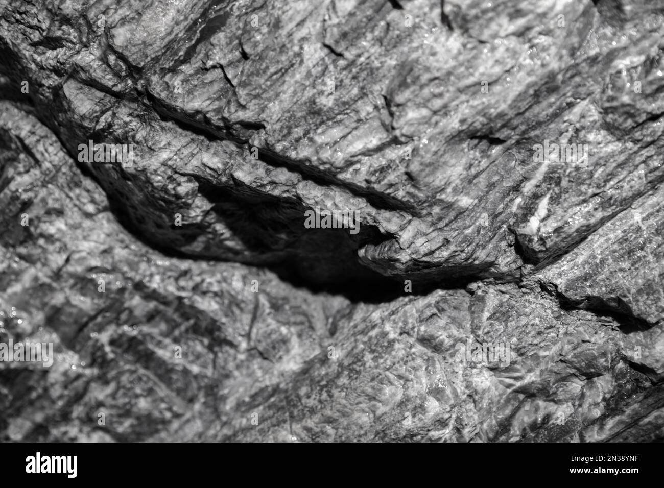 Mur en marbre gris brut naturel. Texture abstraite de la photo d'arrière-plan Banque D'Images