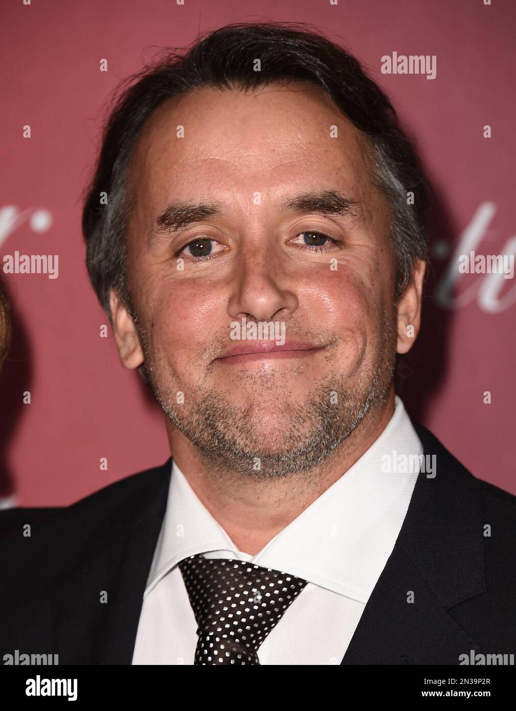 Richard Linklater, winner of the Sonny Bono visionary award, poses in the press room at the 26th annual Palm Springs International Film Festival Awards Gala on Saturday, Jan. 3, 2015, in Palm Springs, Calif. (Photo by Jordan Strauss/Invision/AP) Banque D'Images