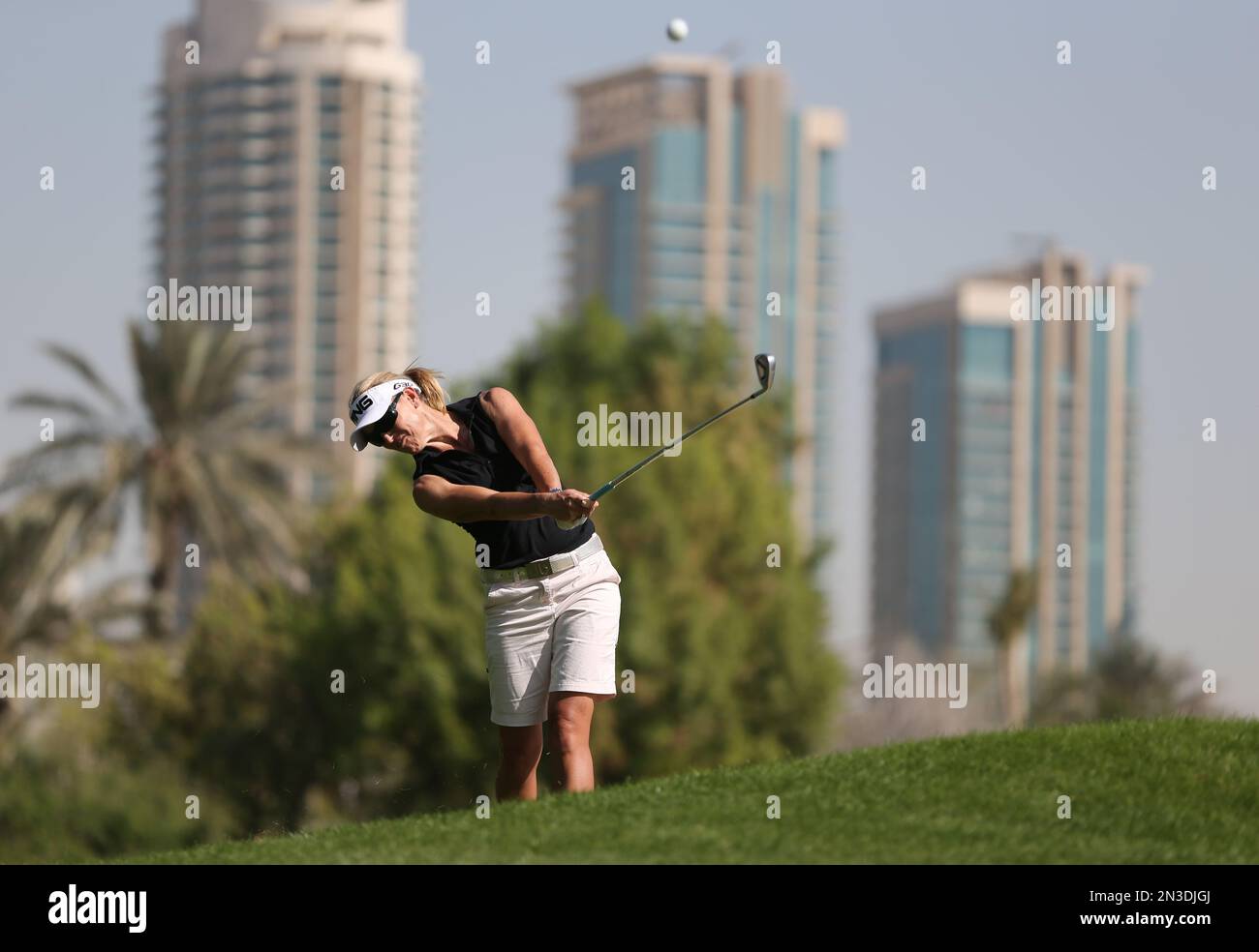 Carin Coch of Sweden plays a ball on the 9th hole during round one of the Omega Dubai Ladies Masters in Dubai, United Arab Emirates, Wednesday, Dec. 10, 2014. (AP Photo/Kamran Jebreili) Banque D'Images