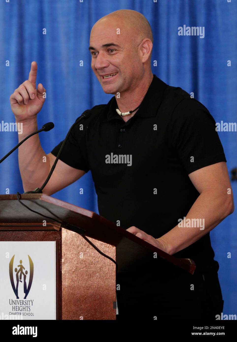 Hall of Fame tennis player Andre Agassi talks during an assembly at ...
