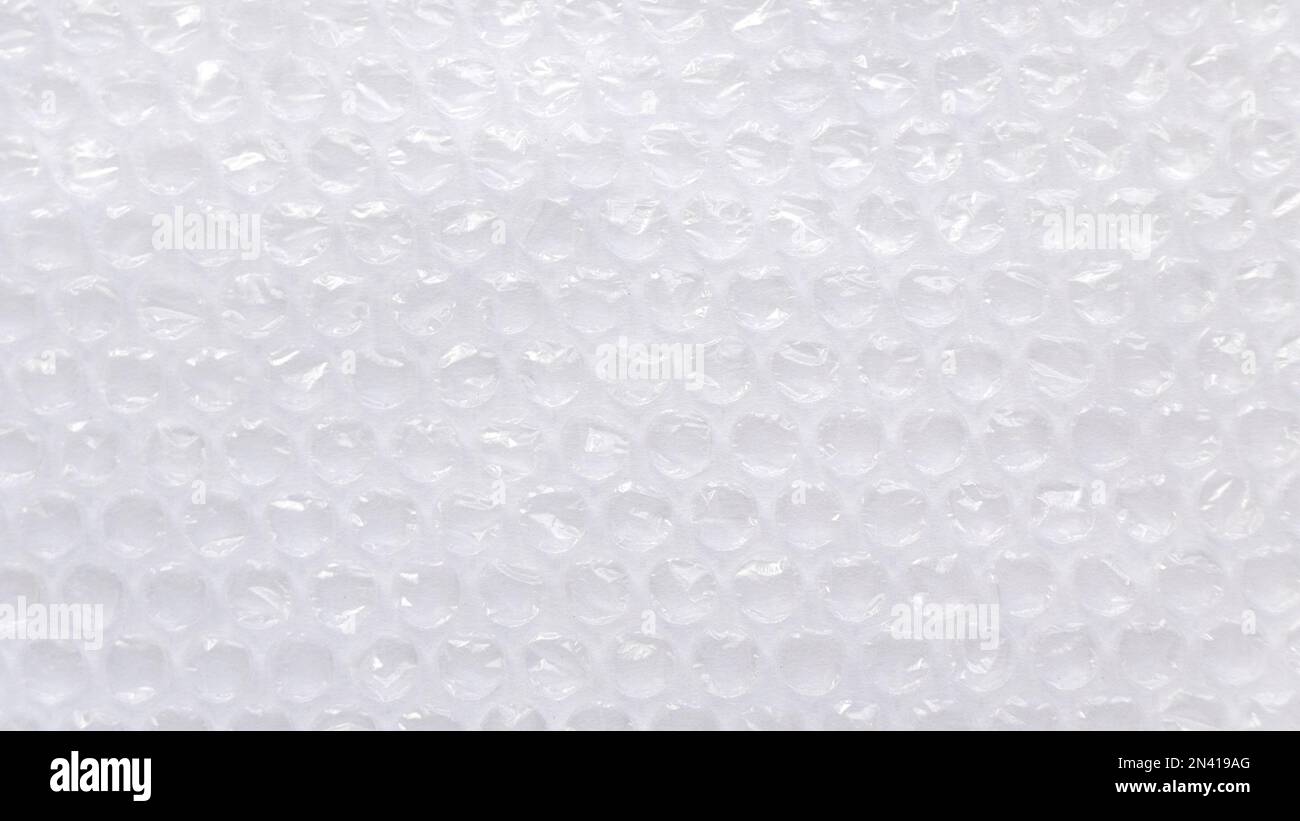 Fond et texture de film à bulles en plastique blanc. Banque D'Images