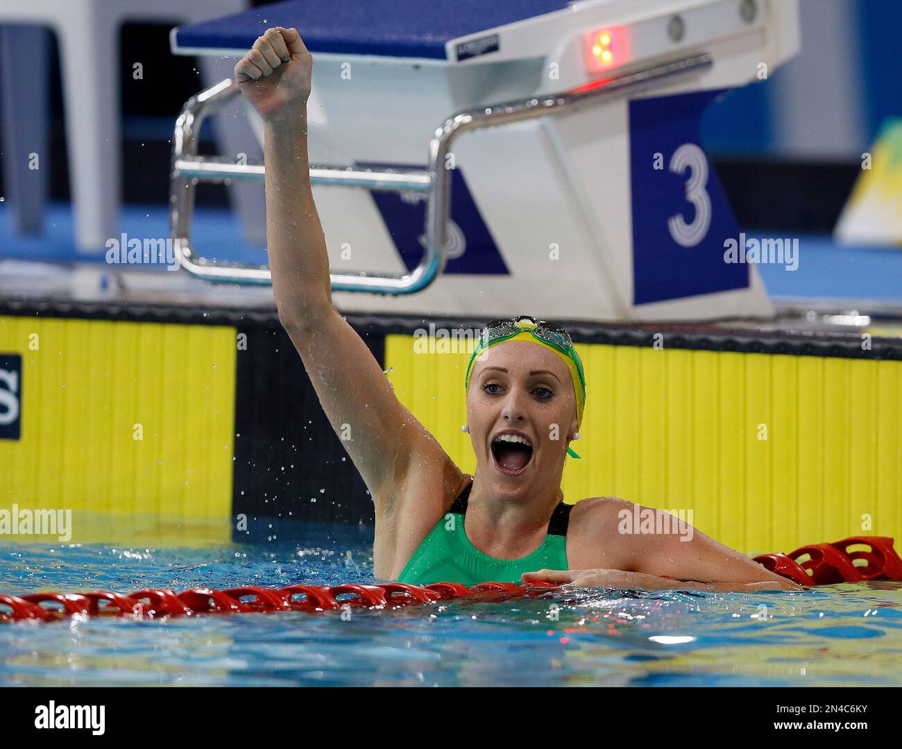 Australia's Taylor McKeown celebrates after winning the 200m breaststroke swimming competition at the Tollcross International Swimming Centre during the Commonwealth Games 2014 in Glasgow, Scotland, Saturday July 26, 2014. (AP Photo/Kirsty Wigglesworth) Banque D'Images