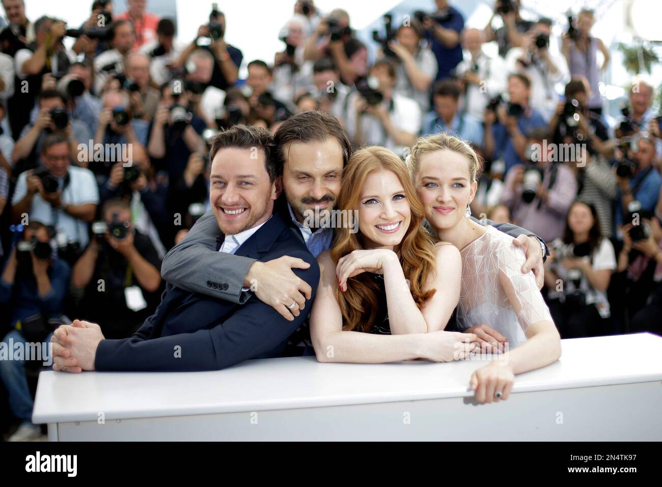 From left, actor James McAvoy, director Ned Benson, actress Jessica Chastain and actress Jess Weixler pose for photographers during a photo call for The Disappearance of Eleanor Rigby at the 67th international film festival, Cannes, southern France, Sunday, May 18, 2014. (AP Photo/Thibault Camus) Banque D'Images