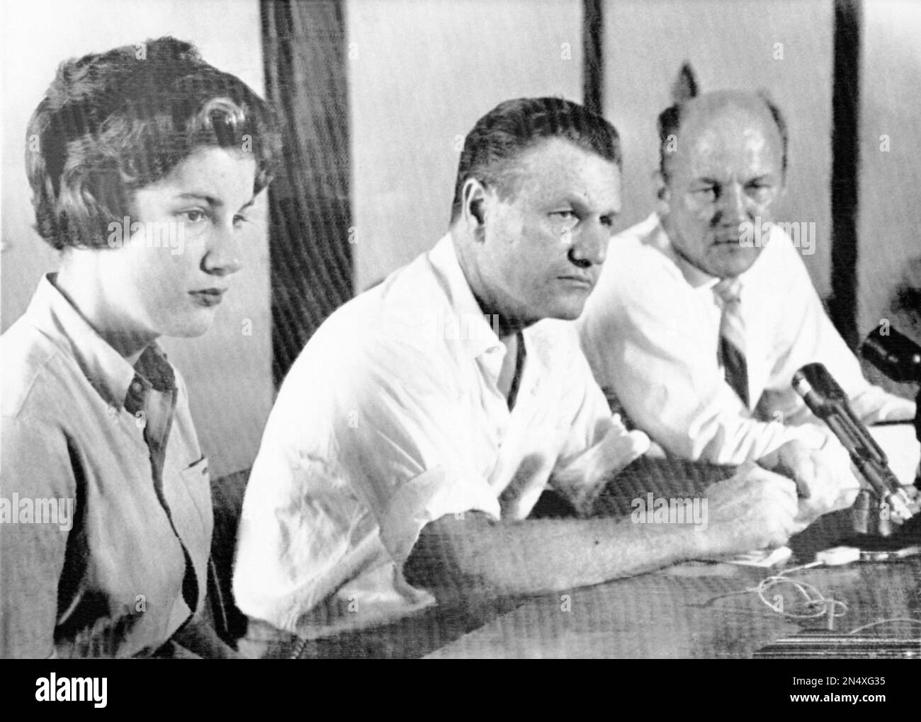 Governor Nelson Rockefeller of New York, center, addresses newsmen