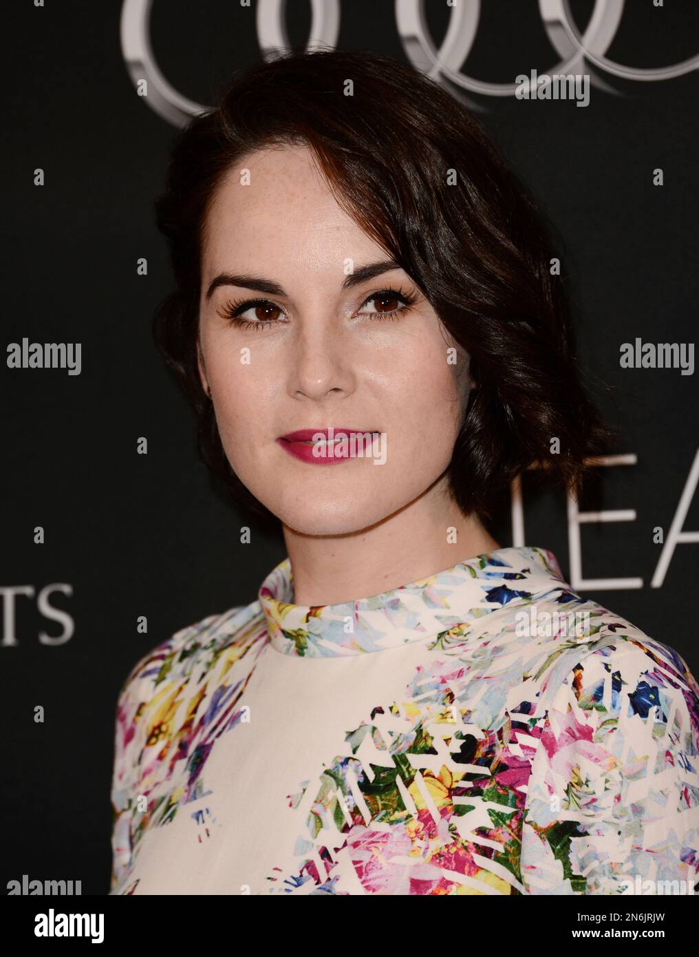 Actress Michelle Dockery arrives at the BAFTA's Los Angeles TV Tea party at the SLS Hotel on Saturday, Sept. 21, 2013 in Los Angeles. (Photo by Dan Steinberg/Invision/AP) Banque D'Images