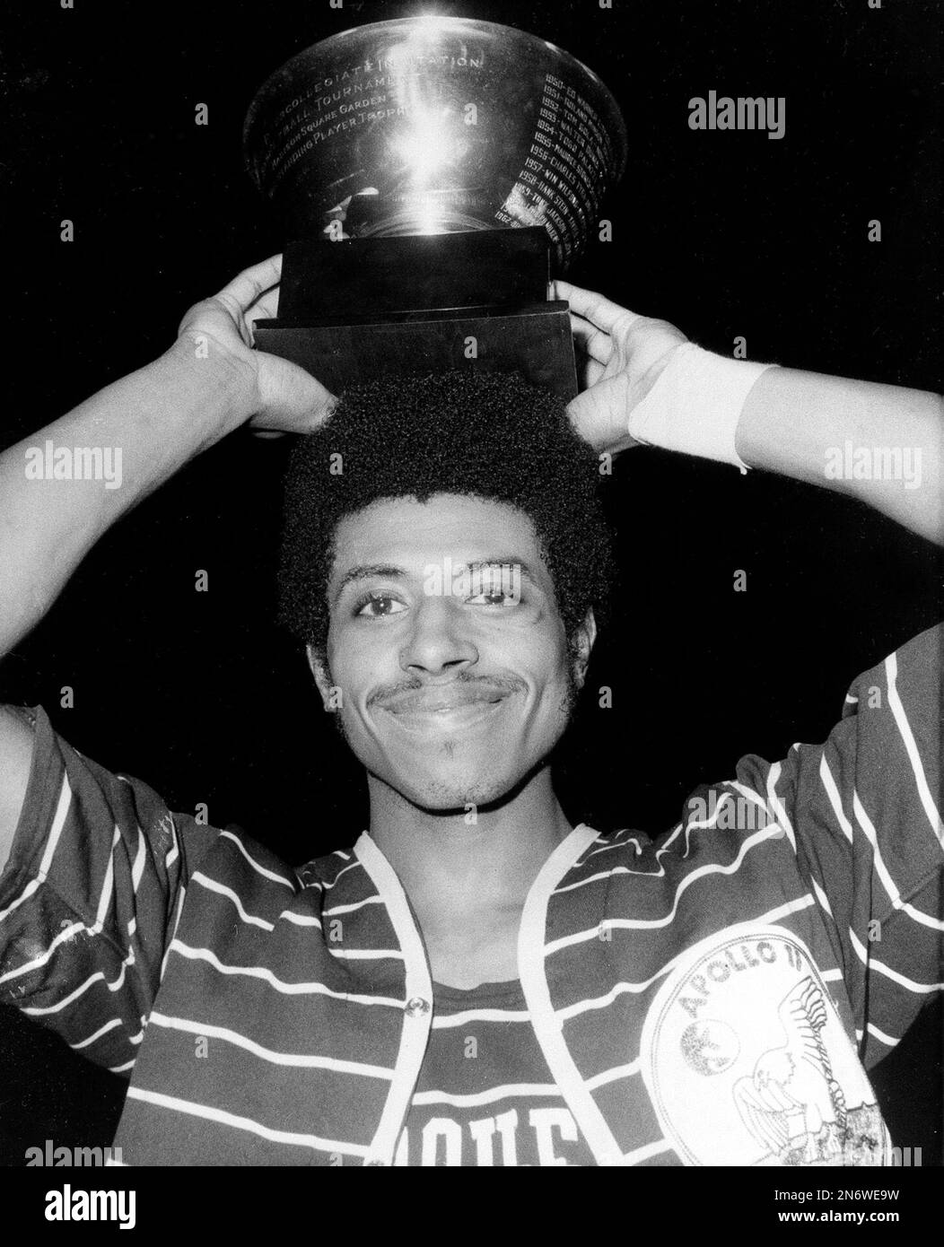 FILE- In this March 21, 1970 file Photo, Marquette guard Dean Meminger, smiles as he poses with