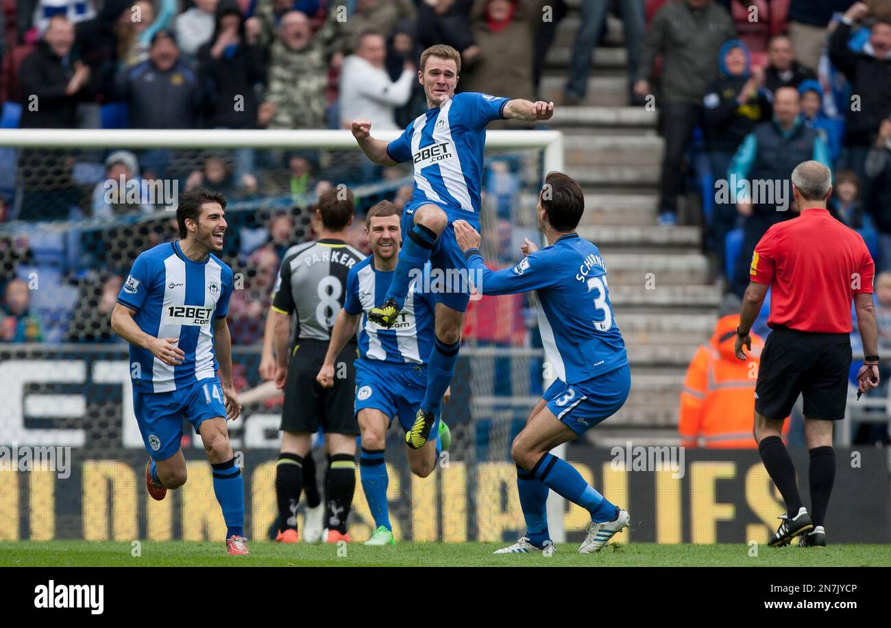 Wigan Athletic's Callum McManaman celebrates after scoring against Tottenham during their English Premier League soccer match at The DW Stadium, Wigan, England, Saturday April 27, 2013. (AP Photo/Jon Super) Banque D'Images