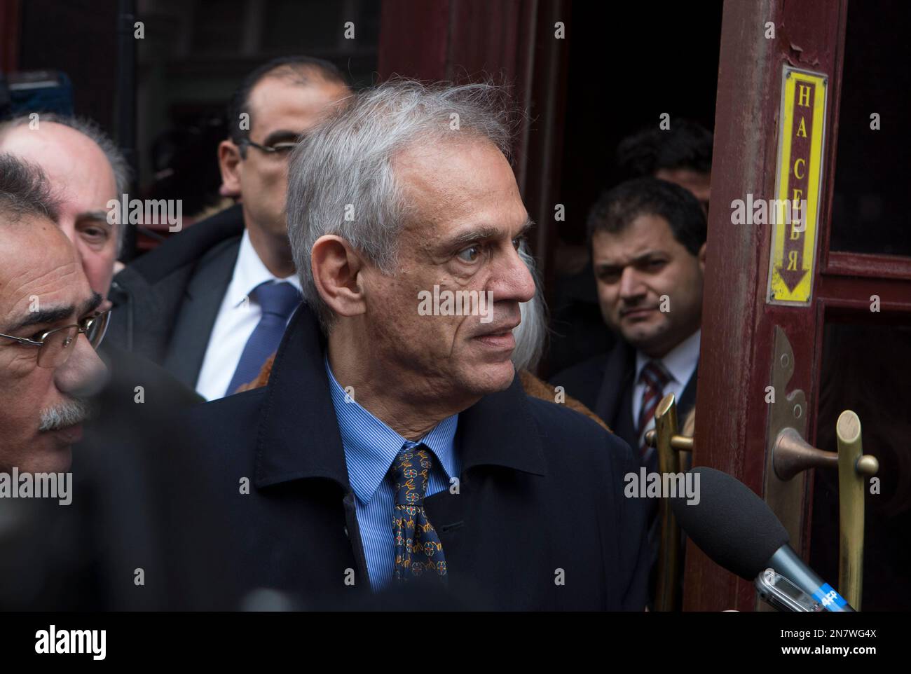 Cyprus' Finance Minister Michalis Sarris, center, leaves after his meeting with Russian Finance Minister Anton Siluanov at the building of Russian Finance Ministry in Moscow, Russia, Wednesday, March 20, 2013. Cyprus' finance minister is in Russia for talks with the Kremlin over financial aid for the troubled island nation. (AP Photo/Misha Japaridze) Banque D'Images