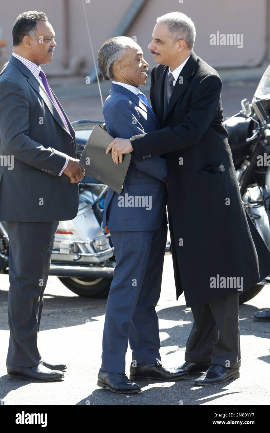 U.S. Attorney General Eric Holder hugs Rev. Al Sharpton in Selma, Ala