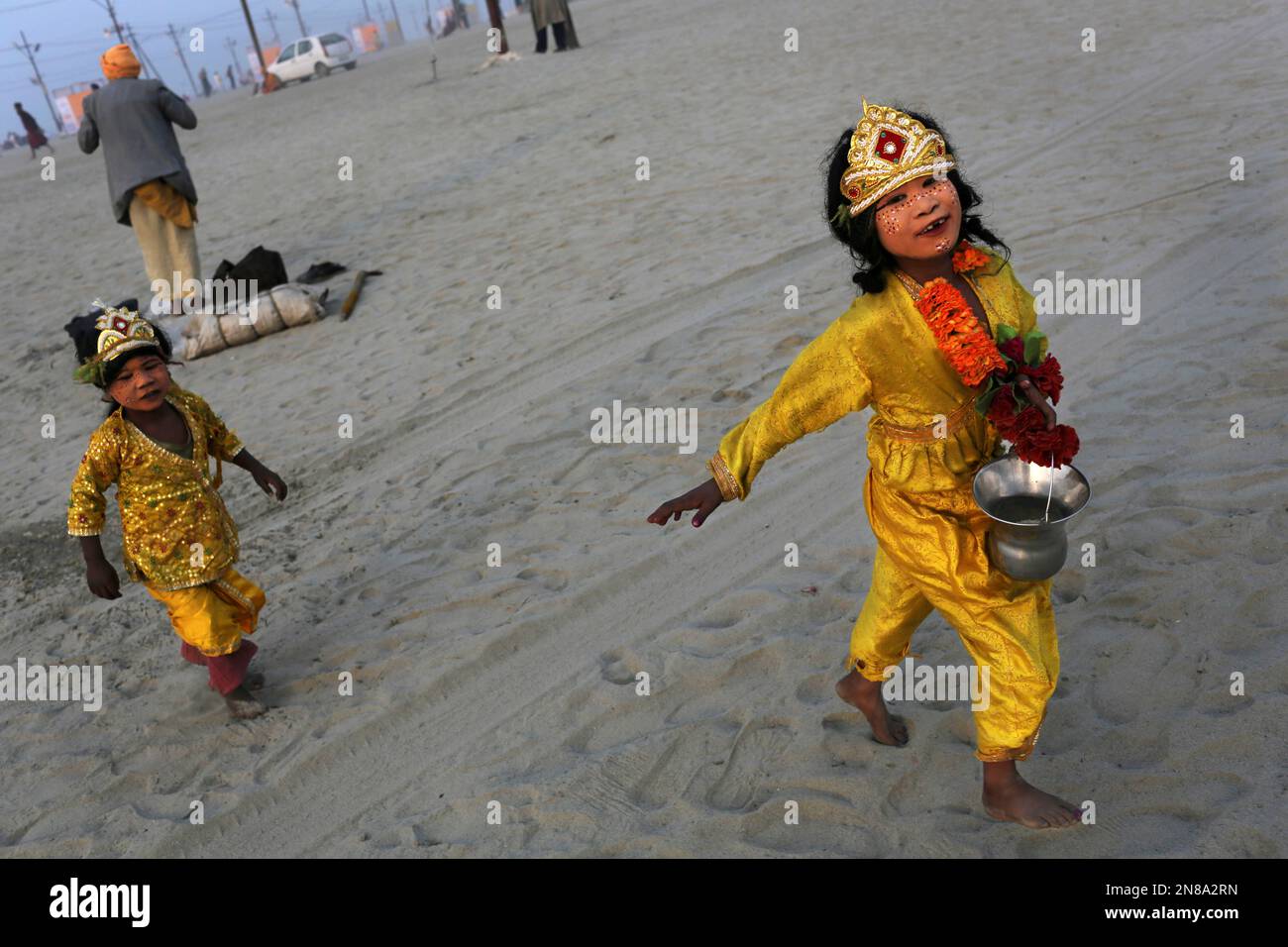 Indian Hindu children dressed as gods beg for alms from devotees at ...