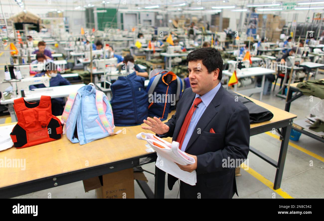 Miguel Caballero, owner of the Colombian company of the same name that makes stylish bulletproof clothing, speaks during an interview, at his factory on the outskirts of Bogota, Colombia, Thursday, Jan. 3, 2013. Caballero who has made armored vests for adults for more than 20 years, said he had never thought about making bulletproof goods for children. But that changed after the Dec. 14 slaying of 20 small children and six adults at the Sandy Hook Elementary in Newtown, Connecticut. His new line of products are designed for children ranging in age from 8-16 years and are priced at anywhere fro Banque D'Images
