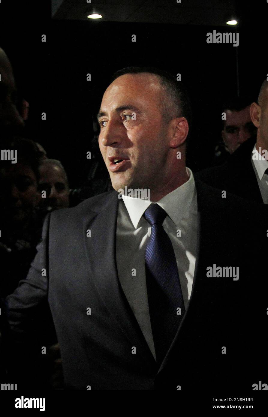 Former ethnic Albanian rebel commander and former Kosovo Prime Minister Ramush Haradinaj, smiles as he arrives in capital Pristina, Kosovo on Thursday, Nov. 29, 2012. A U.N. war crimes tribunal has acquitted the former prime minister of Kosovo and two of his former Kosovo Liberation Army comrades for the second time on charges murdering and torturing Serbs and their supporters in Kosovo's war for independence. ( AP Photo / Visar Kryeziu ) Banque D'Images