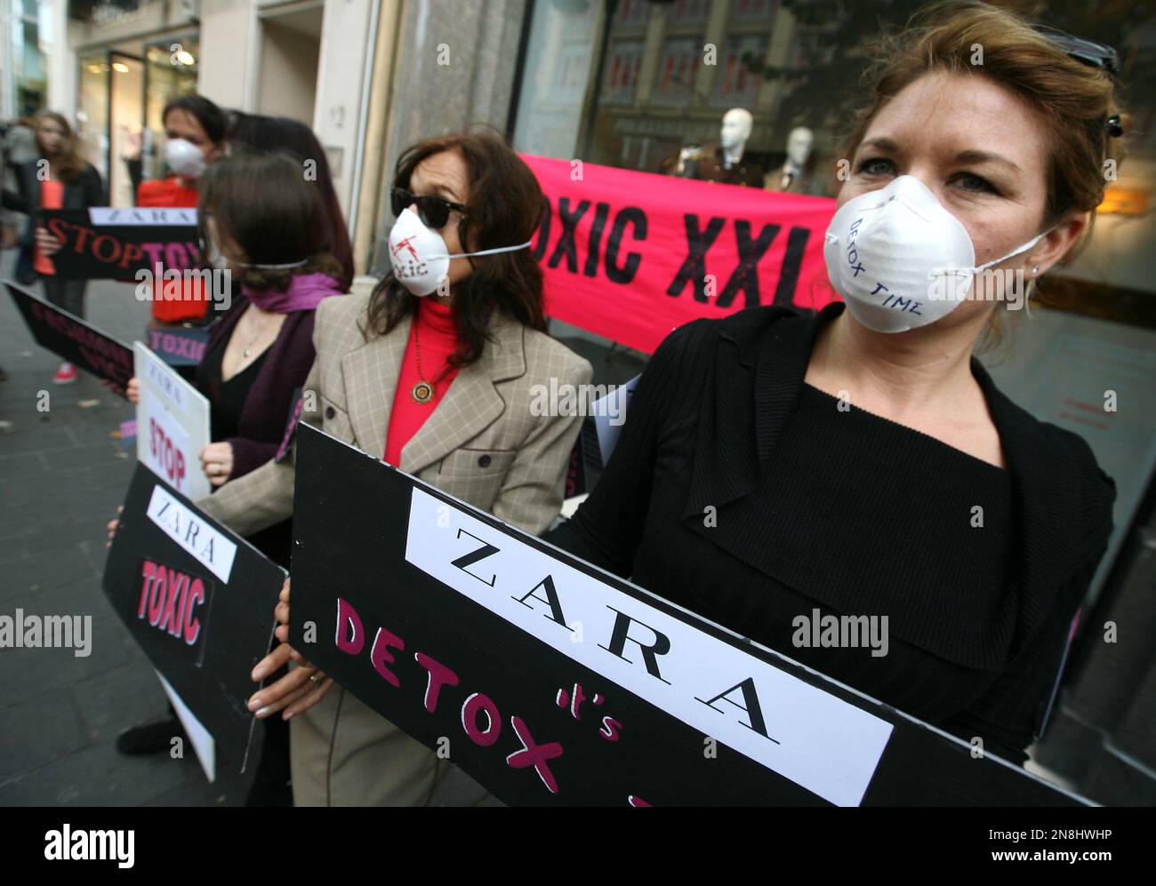French activists from the international environmental organization " Greenpeace" demonstrate in front of a fashion store "Zara" in Nice,  southeastern France, to protest against hazardous chemicals in clothing,  Saturday, Nov.24, 2012.Greenpeace is ...