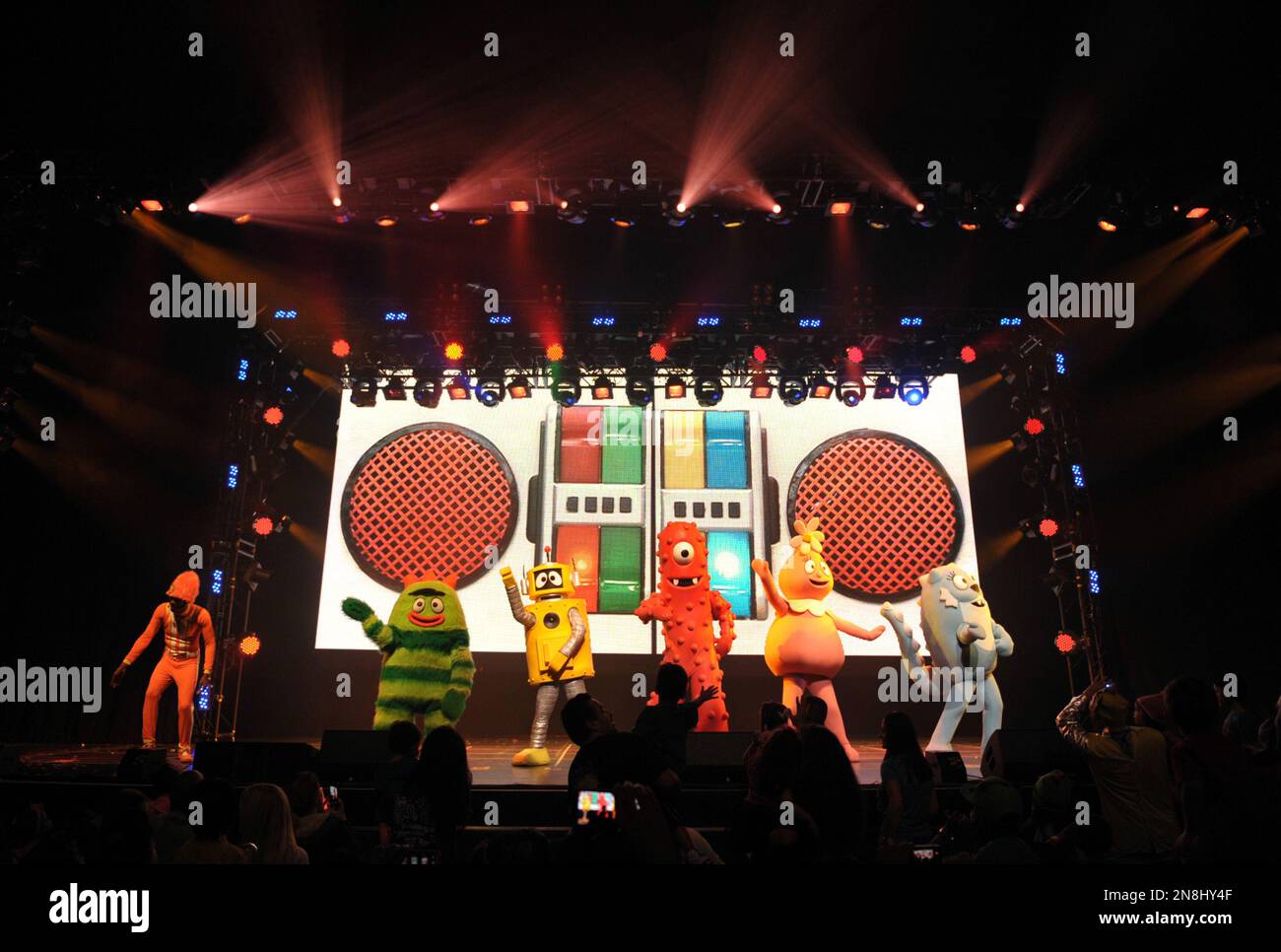 From left, DJ Lance Rock, Brobee, Plex, Muno, Foofa and Toodee perform onstage at Yo Gabba Gabba! Live!: Get The Sillies Out! 50+ city tour kick-off performance on Thanksgiving weekend at Nokia Theatre L.A. Live on Friday Nov. 23, 2012 in Los Angeles. (Photo by John Shearer/Invision for GabbaCaDabra, LLC./AP Images) Banque D'Images
