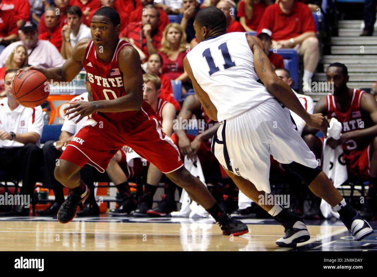 NC State’s Rodney Purvis, left, drives the ball against Penn State’s Jermaine Marshall during the second half of a NCAA college basketball game in Bayamon, Puerto Rico, Thursday, Nov. 15, 2012. (AP Photo/Ricardo Arduengo) Banque D'Images