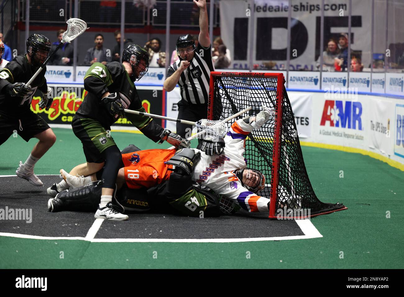 11 février 2023 : le défenseur des Thunderbirds de Halifax court dans le gardien de but de Rochester Knighthawks Rylan Hartley (49) au deuxième trimestre. Les Rochester Knighthawks ont accueilli les Halifax Thunderbirds dans un match de la Ligue nationale de crosse au Blue Cross Arena de Rochester, New York. (Jonathan Tenca/CSM) Banque D'Images