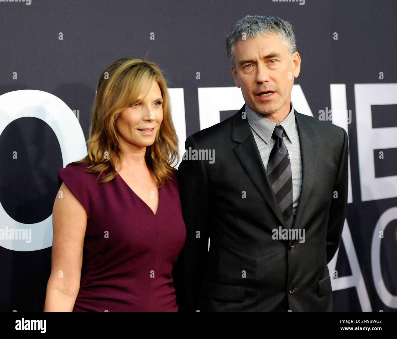 Writer and director Tony Gilroy and wife Susan attend the world premiere of "The Bourne Legacy" at the Ziegfeld Theatre on Monday July 30, 2012 in New York. (Photo by Evan Agostini/Invision/AP) Banque D'Images