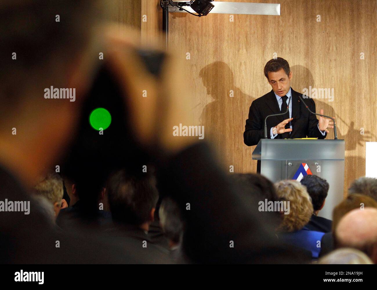 French President and UMP conservative party candidate for the upcoming presidential election Nicolas Sarkozy delivers his speech during a meeting with managers of small companies in Puteaux, west of Paris, Tuesday, April 10, 2012. (AP Photo/Remy de la Mauviniere) Banque D'Images