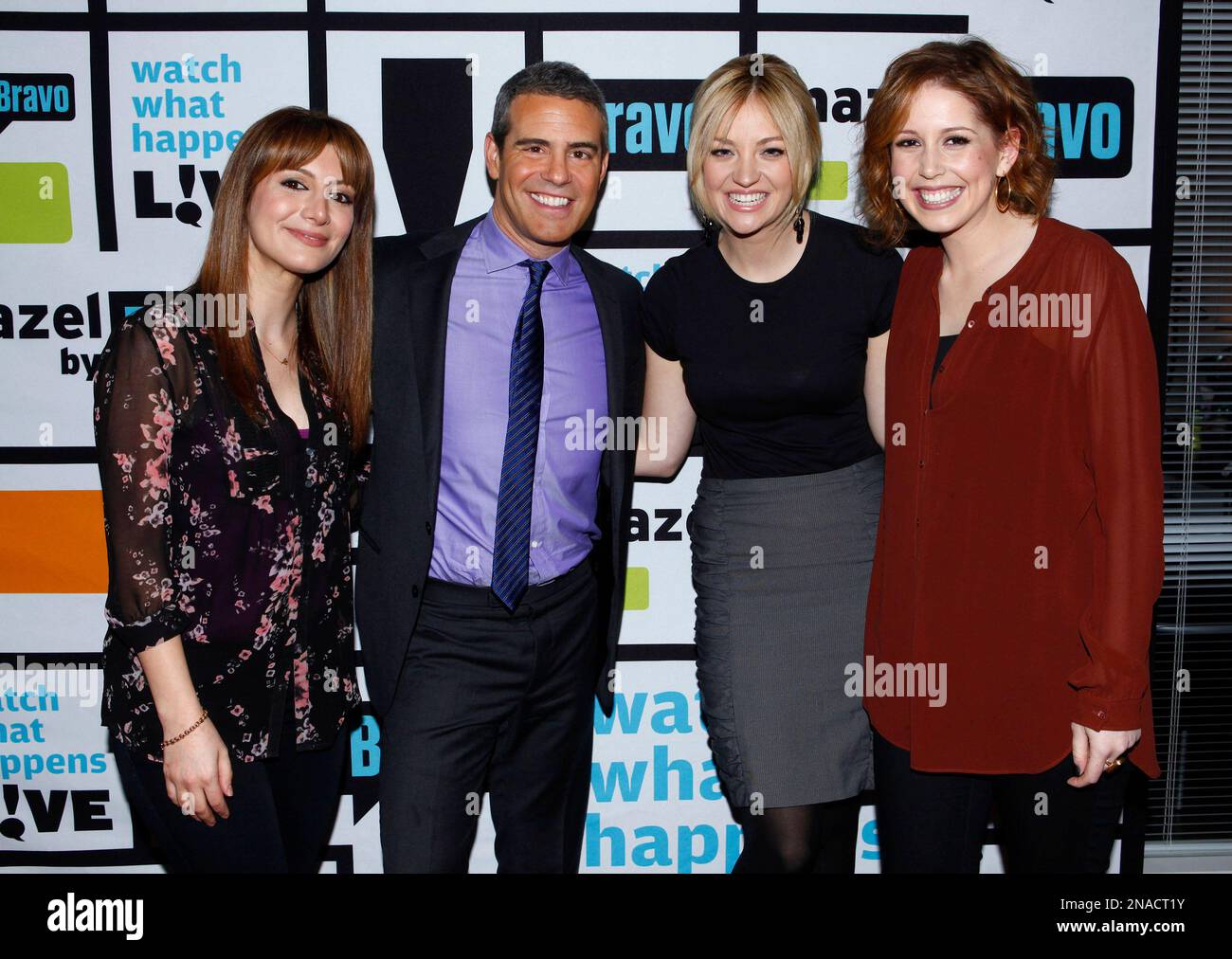 COMMERCIAL IMAGE - In this photograph taken by AP Images for Bravo, from left to right, Nasim Pedrad, Andy Cohen, Abby Elliott and Vanessa Bayer pose backstage after Bravo's "Watch What Happens Live" show on Tuesday, Jan. 31, 2012, in New York. (Peter Kramer/AP Images for Bravo) Banque D'Images