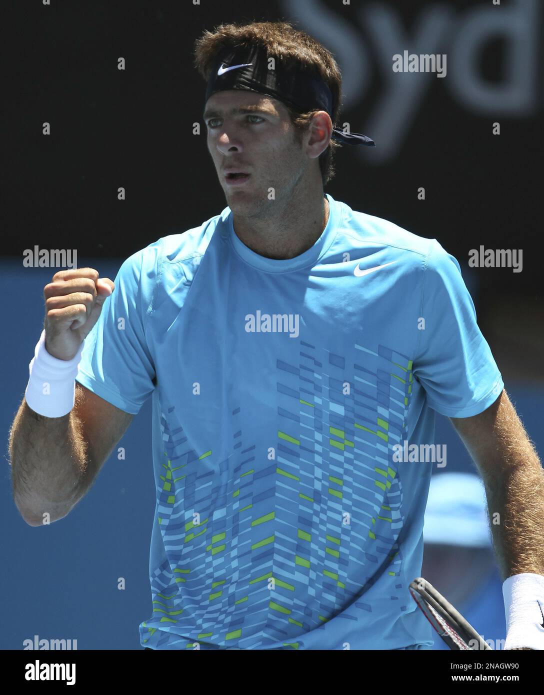 Juan Martin del Potro of Argentina celebrates winning his match against Poland's Lukasz Kubot at the Sydney International tennis tournament in Sydney, Australia, Wednesday, Jan. 11, 2012. Del Potro won the match 6-4, 6-2.(AP Photo/Rob Griffith) Banque D'Images