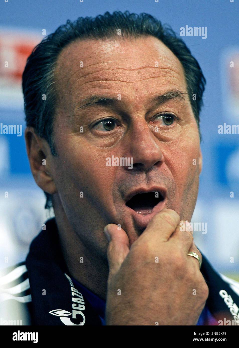 New head coach of Bundesliga soccer club FC Schalke 04 Huub Stevens from the Netherlands reacts during a press conference in Gelsenkirchen, Germany, Tuesday, Sept. 27, 2011. Stevens follows former head coach Ralf Rangnick, who resigned last week because of suffering a burnout syndrom. Stevens was head coach at Schalke between 1996 and 2002, when he was winning the UEFA Cup and two German soccer cups with the club. (AP Photo/Martin Meissner) Banque D'Images
