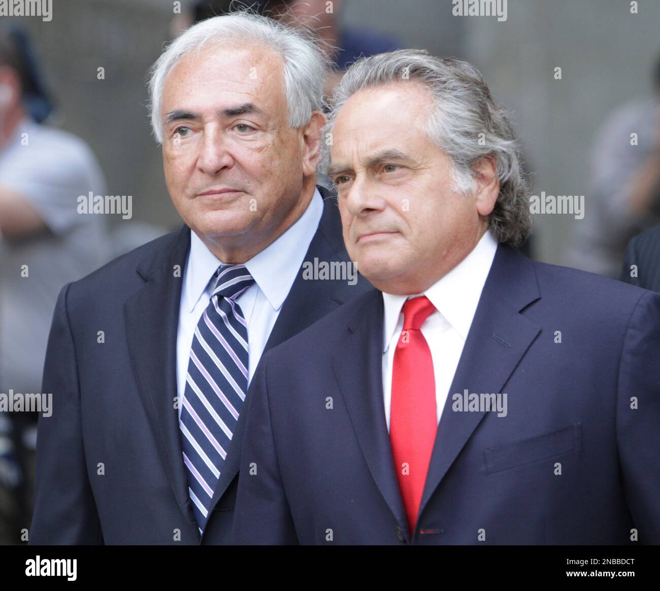 Former International Monetary Fund leader Dominique Strauss-Kahn, left, leaves Manhattan state Supreme court with his attorney Benjamin Brafman, Tuesday, Aug. 23, 2011 in New York. (AP Photo/Mary Altaffer) Banque D'Images