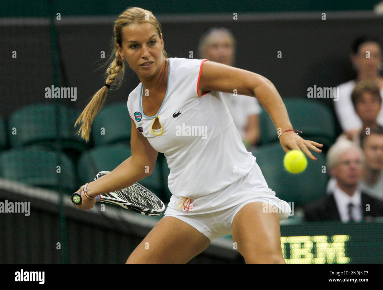 Slovakia's Dominika Cibulkova returns a forehand shot to Russia's Maria Sharapova during their match at the All England Lawn Tennis Championships at Wimbledon, Tuesday, June 28, 2011. (AP Photo/Anja Niedringhaus) Banque D'Images