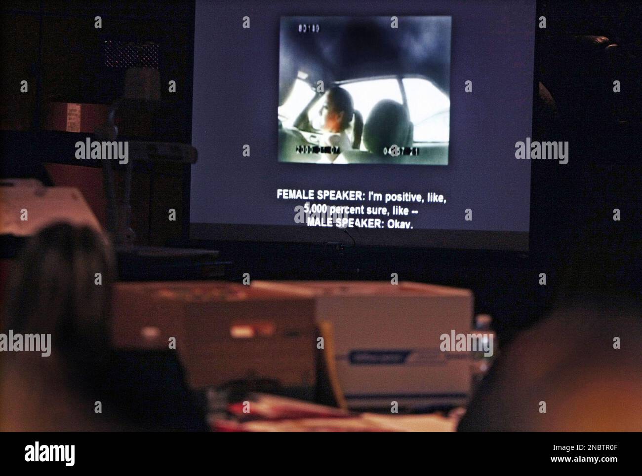 Jurors watch a taped conversation with a fake hitman during Dalia Dippolito's during her trial Wednesday, May 11, 2011 in West Palm Beach, Fla. The trial of Dalia Dippolito, who is accused of hiring an undercover police officer to kill her husband, resumed after a one-week hiatus. The couple was married for six months when she was charged in August 2009. Dippolito faces up to 30 years in prison if convicted as charged. (AP Photo/Richard Graulich, Pool) Banque D'Images