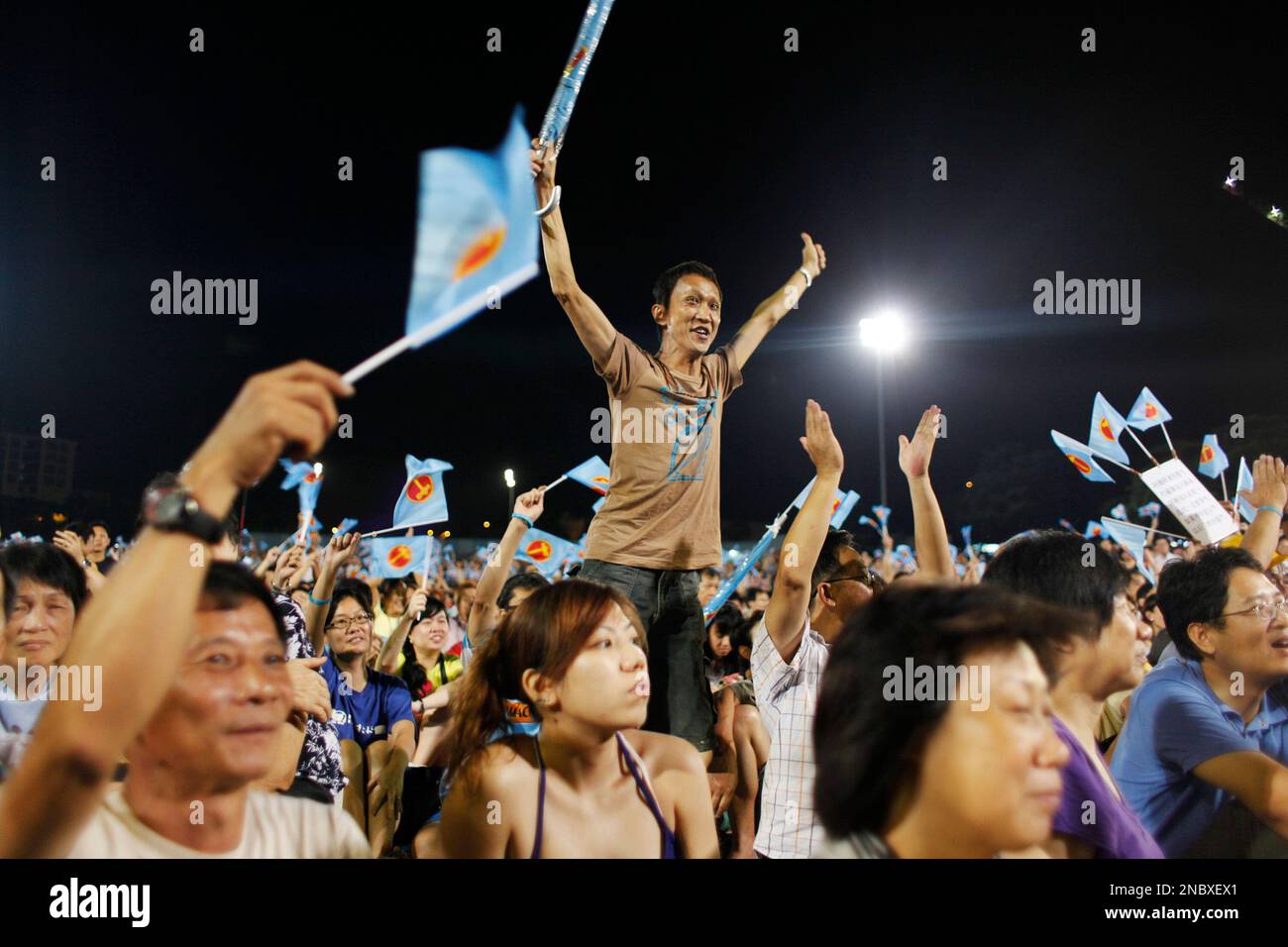 Election Rallies A supporter of the opposition party Worker's Party cheers from the ...