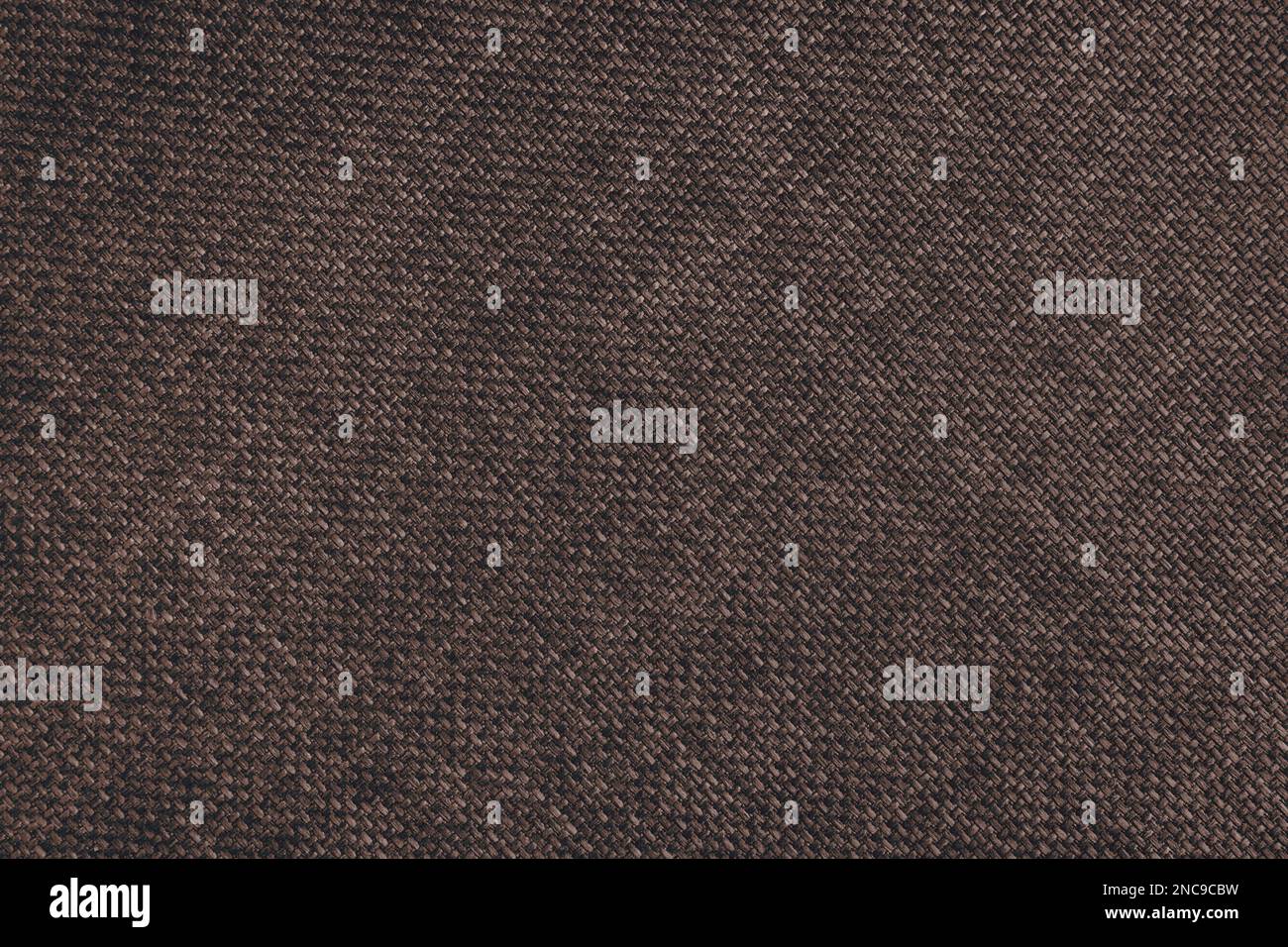 Tissus jacquard, tissu épais brun foncé avec lignes diagonales. Arrière-plan textile, mobilier matériau textile, papier peint, arrière Banque D'Images