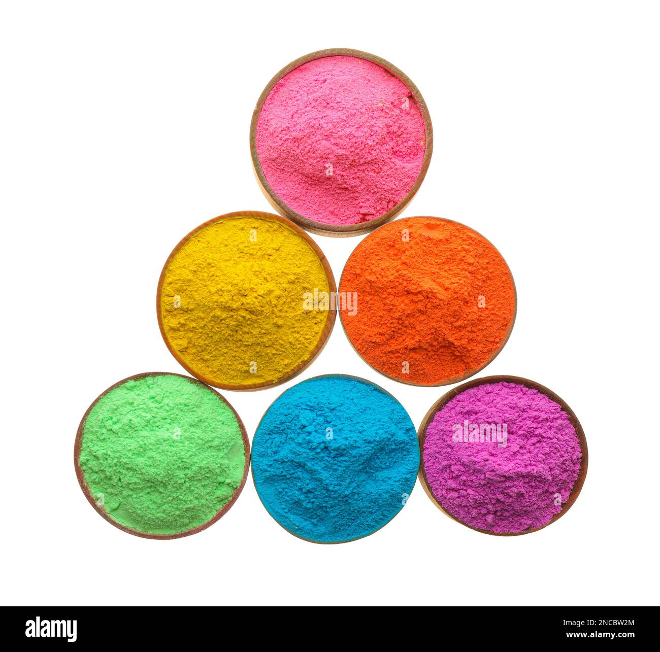 Poudres colorées dans des bols sur fond blanc, vue du dessus. Fête de Holi Banque D'Images