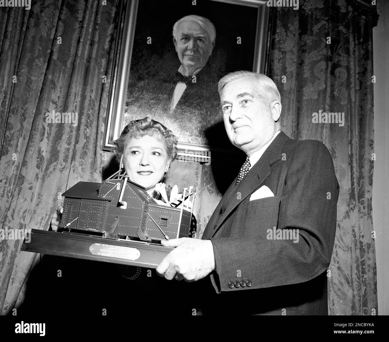 Former screen actress Mary Pickford stands with Charles Edison, former ...