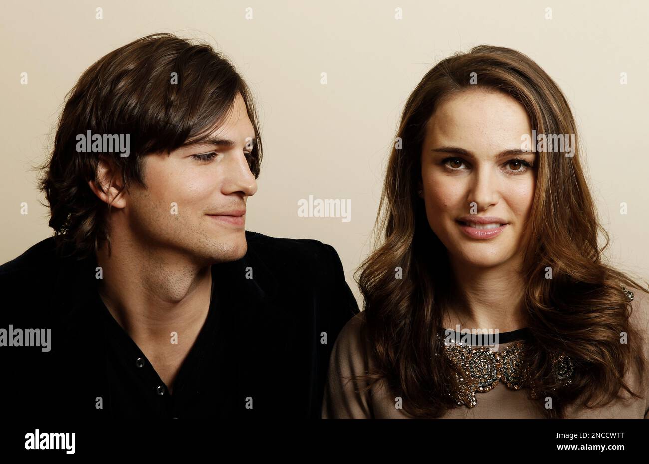 In this Jan. 7, 2011 photo, actor Ashton Kutcher, left, and actress