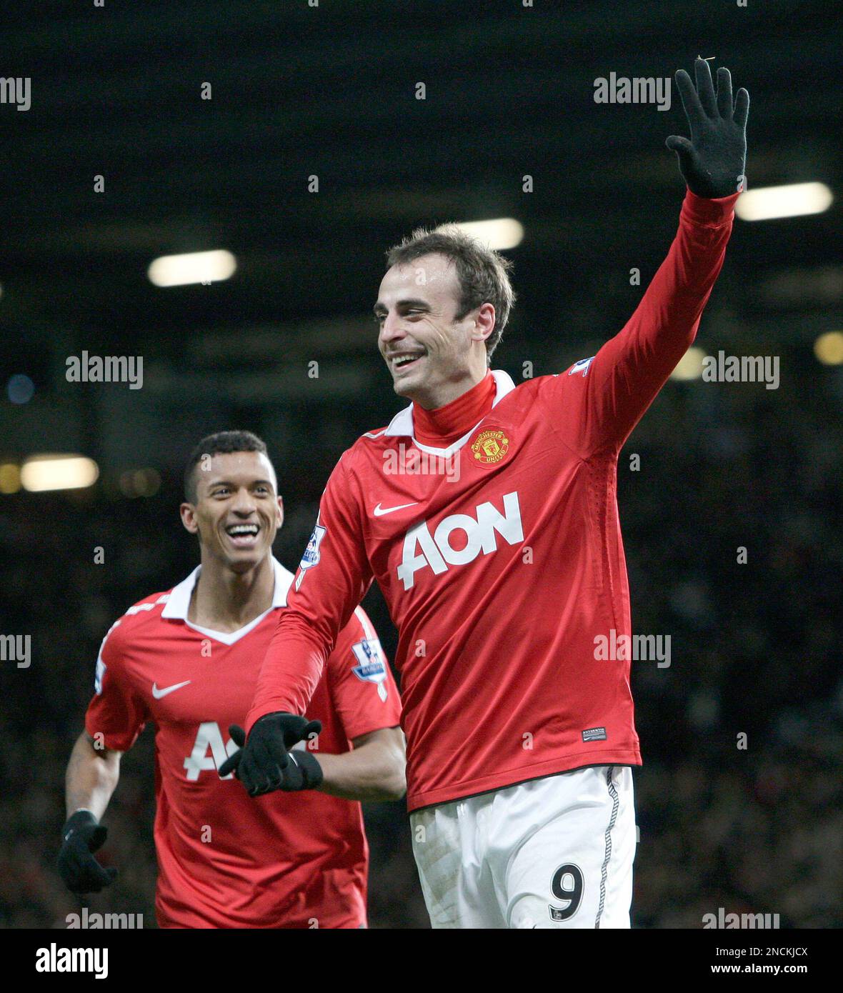Manchester United's Dimitar Berbatov, right, celebrates after scoring his fifth goal against Blackburn Rovers during their English Premier League soccer match at Old Trafford Stadium, Manchester, England, Saturday Nov. 27, 2010. (AP Photo/Jon Super) NO INTERNET/MOBILE USAGE WITHOUT FOOTBALL ASSOCIATION PREMIER LEAGUE(FAPL)LICENCE. EMAIL info@football-dataco.com FOR DETAILS. Banque D'Images