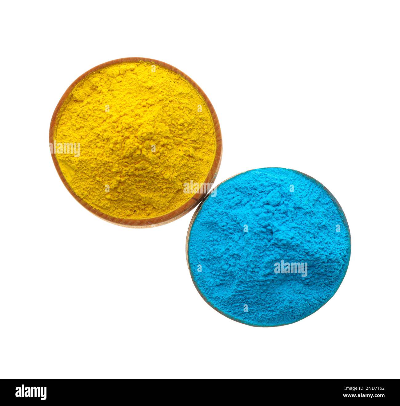 Poudres colorées dans des bols sur fond blanc, vue du dessus. Fête de Holi Banque D'Images