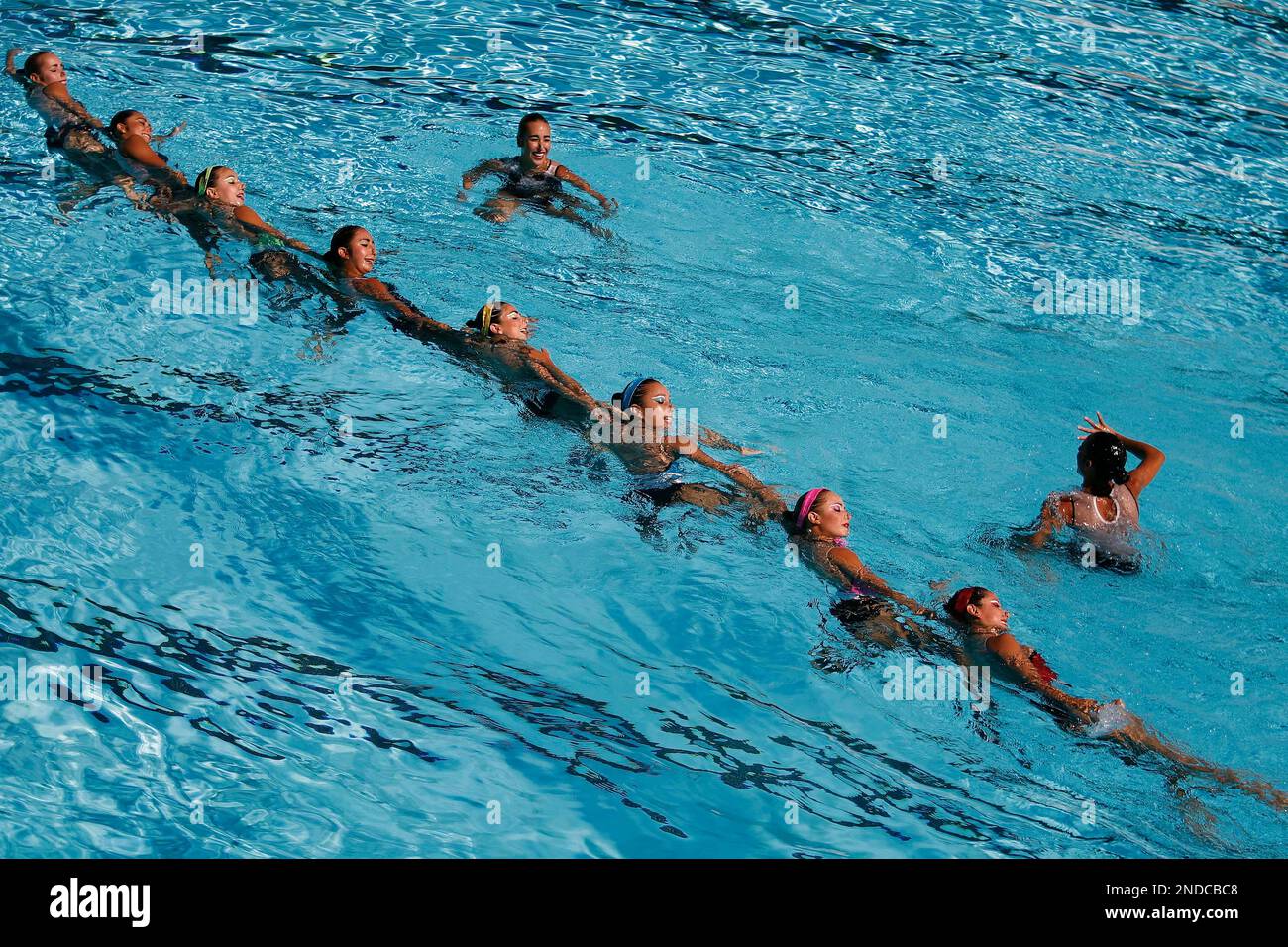 Mexico's synchronized swimming team performs in the combination finals at the Central American and Caribbean Games in Mayaguez, Puerto Rico, Wednesday July 28, 2010. (AP Photo/Ricardo Arduengo) Banque D'Images