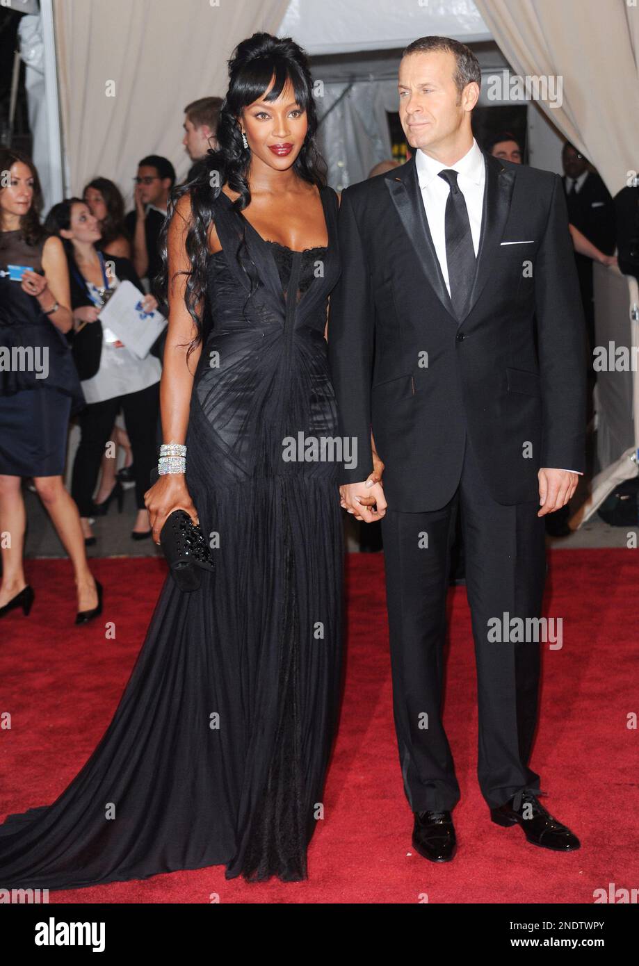 Model Naomi Campbell and boyfriend Vladimir Doronin arrive at the Metropolitan Museum of Art Costume Institute gala, Monday, May 3, 2010 in New York. (AP Photo/Evan Agostini) Banque D'Images