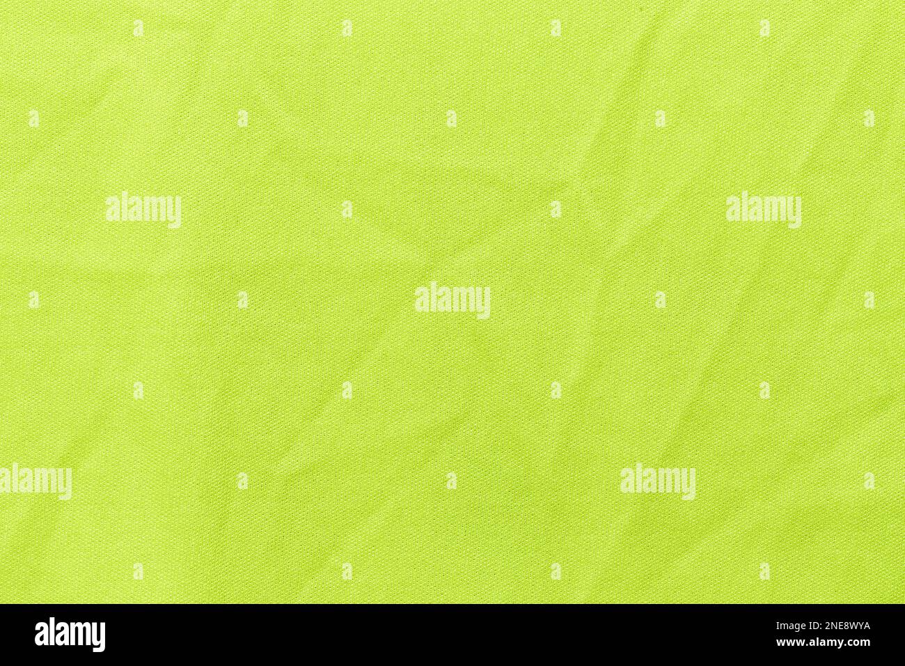 Vert clair texture synthétique du tissu, arrière-plan. Tissu vert clair. Arrière-plan vert clair. Banque D'Images