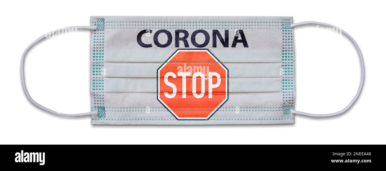 Masque de protection isolé avec le mot CORONA et le PANNEAU STOP Banque D'Images
