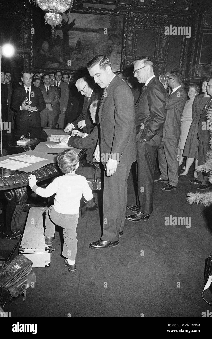 Sen. Walter Mondale, DMinn., center, had to shoo son William Mondale, left, away when the 2