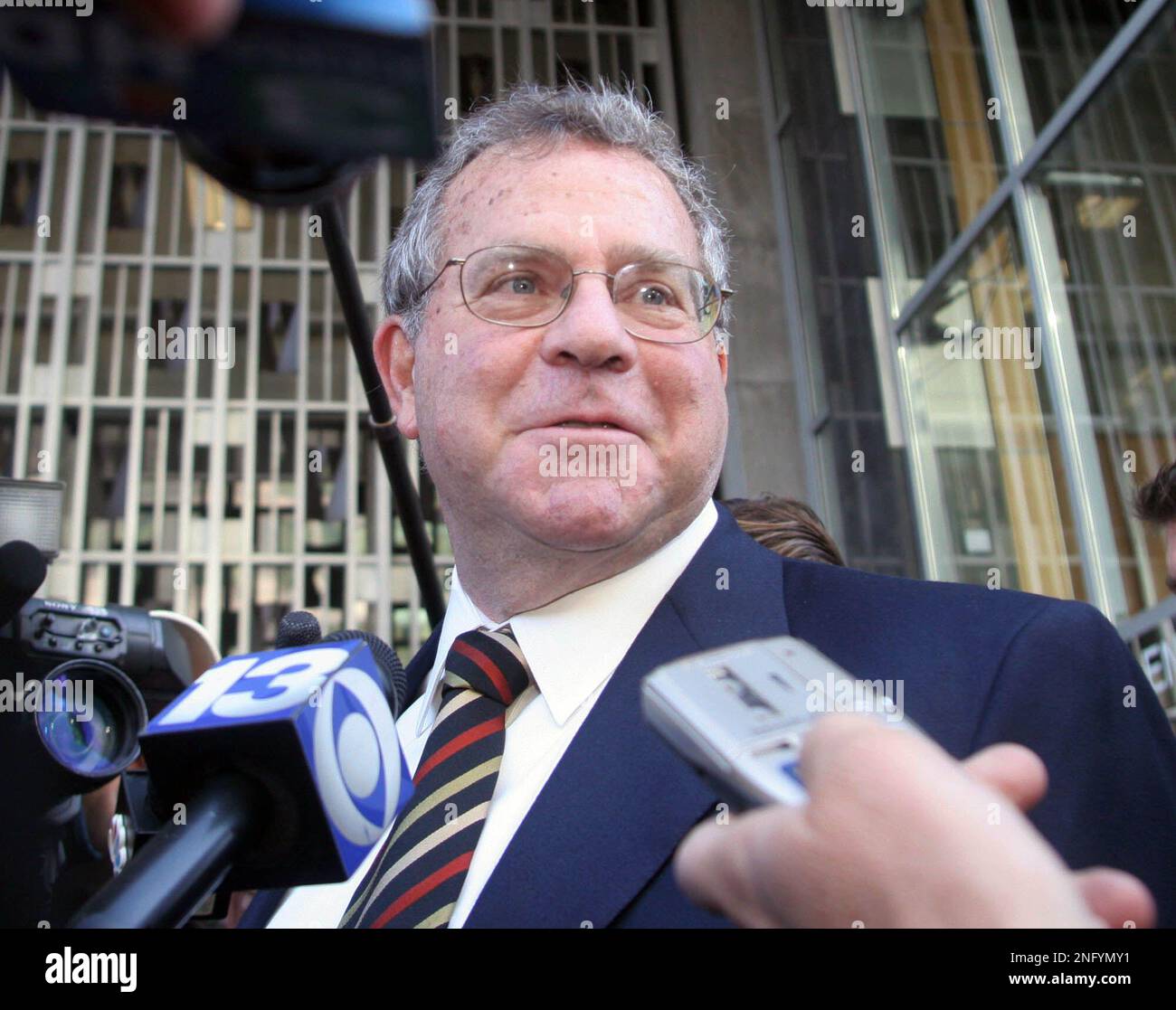 Attorney for Barry Bonds, Allen Ruby, listens to a reporters question after leaving court, where Barry Bonds was indicted on four counts of perjury and one obstruction of justice, Friday, Dec. 7, 2007 in San Francisco. (AP Photo/George Nikitin) Banque D'Images