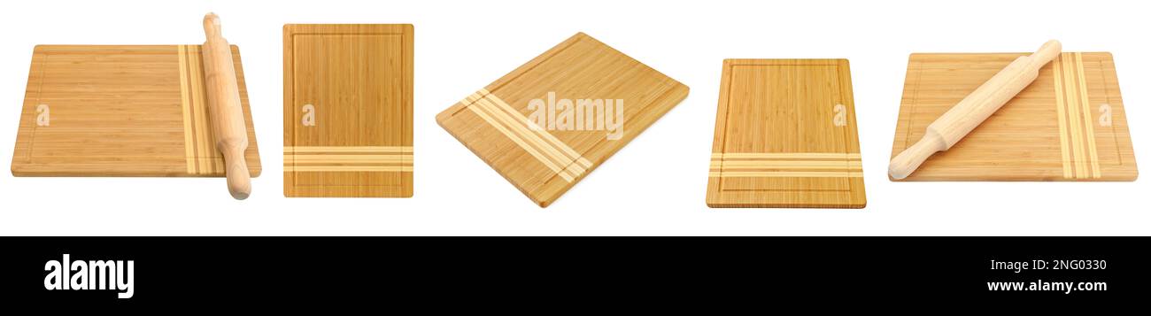 Grand jeu de planches en bois pour couper le pain et la broche de roulement isolée sur fond blanc. Banque D'Images