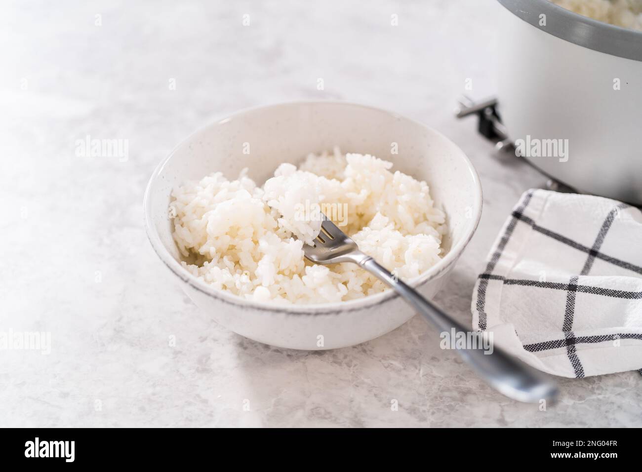 Cuisson du riz Banque D'Images Cuisson du riz Banque D'Images