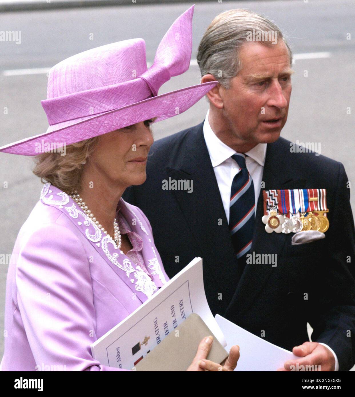 Britain's Prince Charles and his wife the Duchess of Cornwall leave London's Westminster Abbey after attending the Service of Thanksgiving for Gallantry and Valour, Monday June 26, 2006. The thanksgiving service is to mark the 150th anniversary of the creation of the Victoria Cross bravery medal awarded for acts of valour in the presence of the enemy, and in the 150-years to date 1,355 Victoria Crosses have been awarded. (AP PHOTO/Max Nash) Banque D'Images