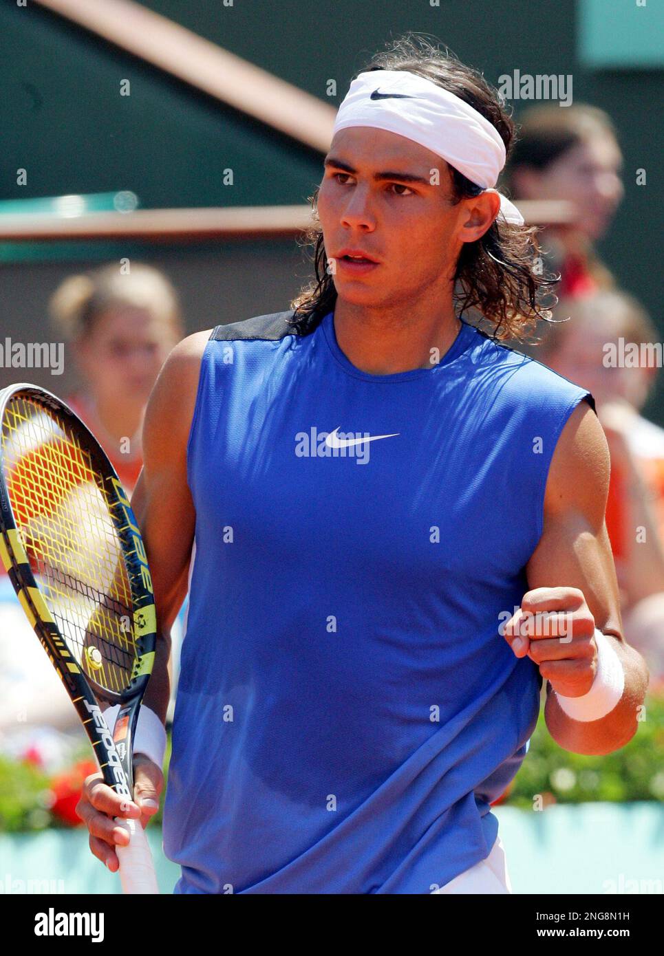 Spain's Rafael Nadal reacts while playing a quarter final match against  Serbia's Novak Djokovic during the French Open tennis tournament at the  Roland Garros stadium in Paris, Wednesday June 7, 2006. (AP