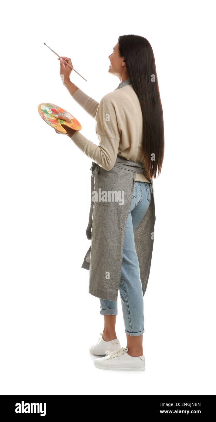 Jeune femme dessin avec une brosse sur fond blanc Banque D'Images