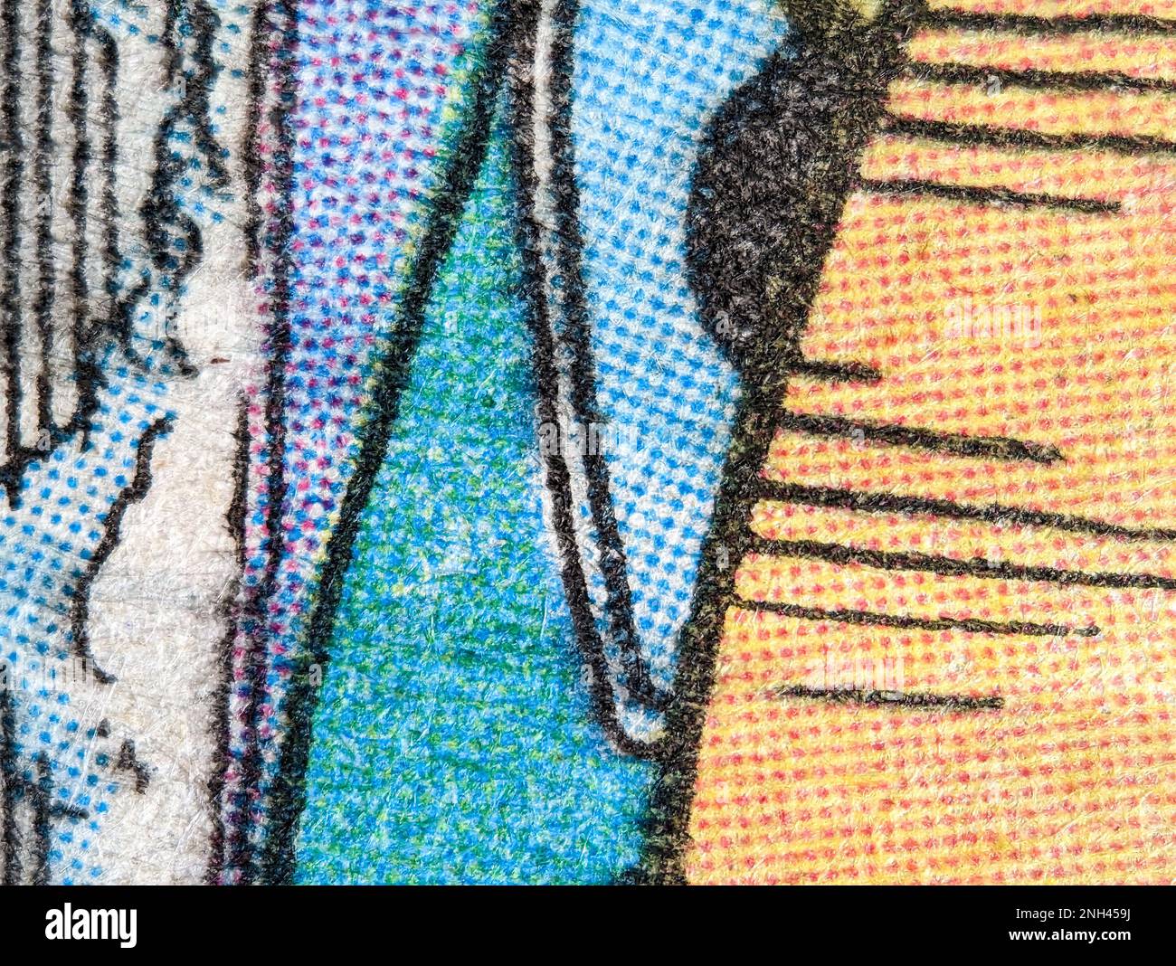 Vue en gros plan du motif d'impression de points sur une ancienne page de bande dessinée avec fond texturé coloré de formes abstraites Banque D'Images