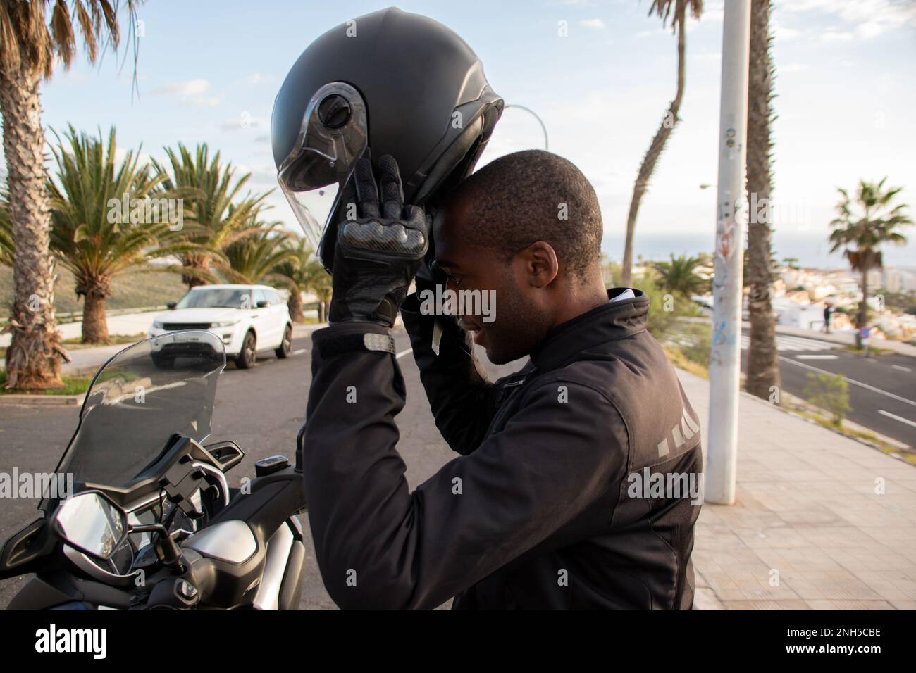 Moto gant africain Banque de photographies et d’images à haute