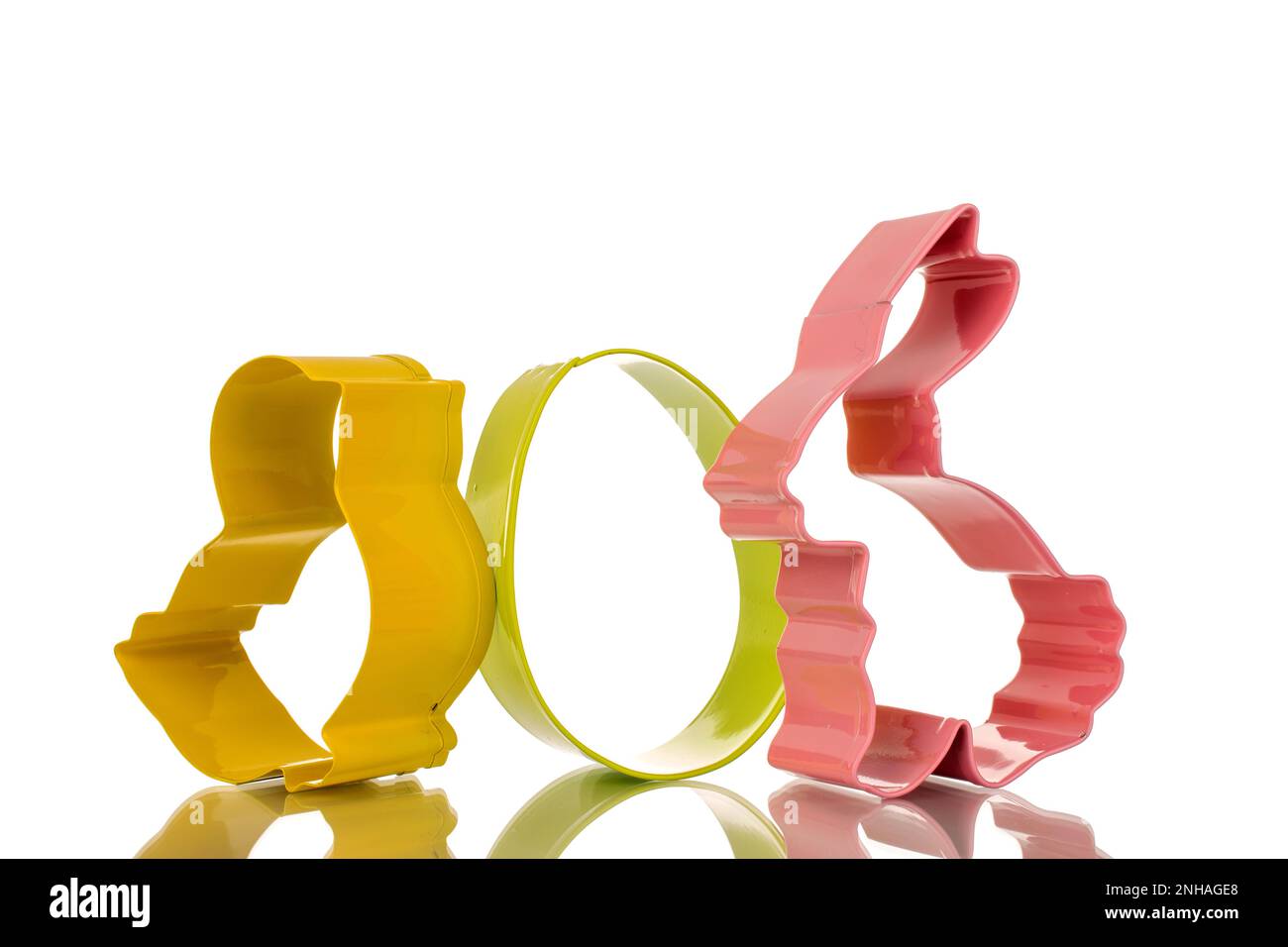 Jeu de trois emporte-pièces, macro, isolés sur fond blanc. Banque D'Images